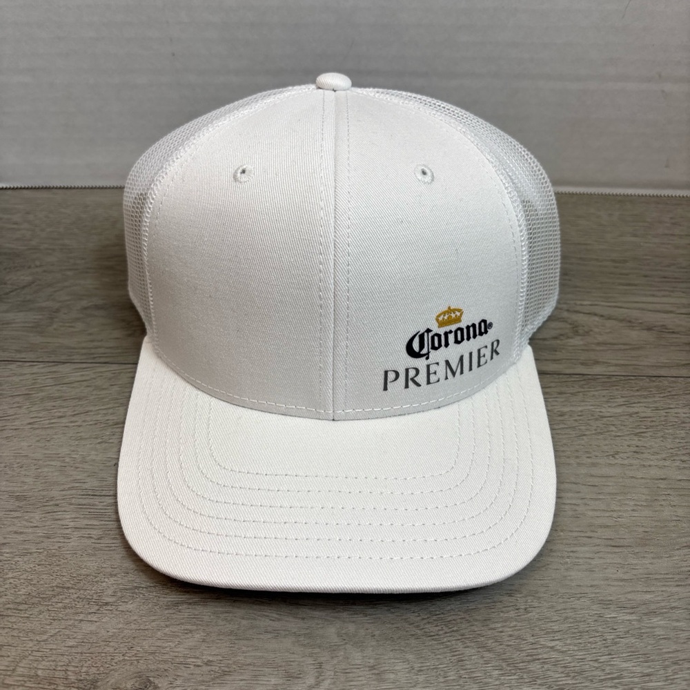 Corona Premier Adjustable Snap Back Vented White Ponytail cap.